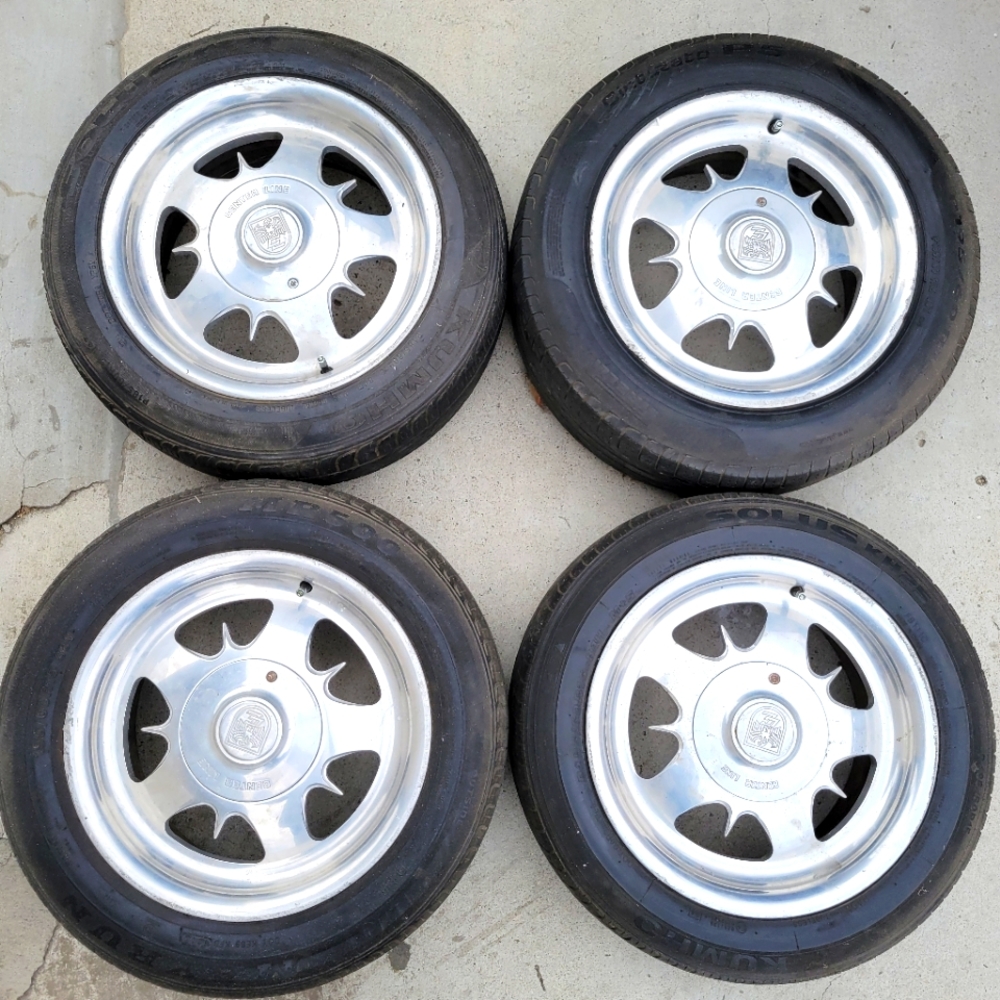 Centerline 15inch rims with center caps %65 tires
